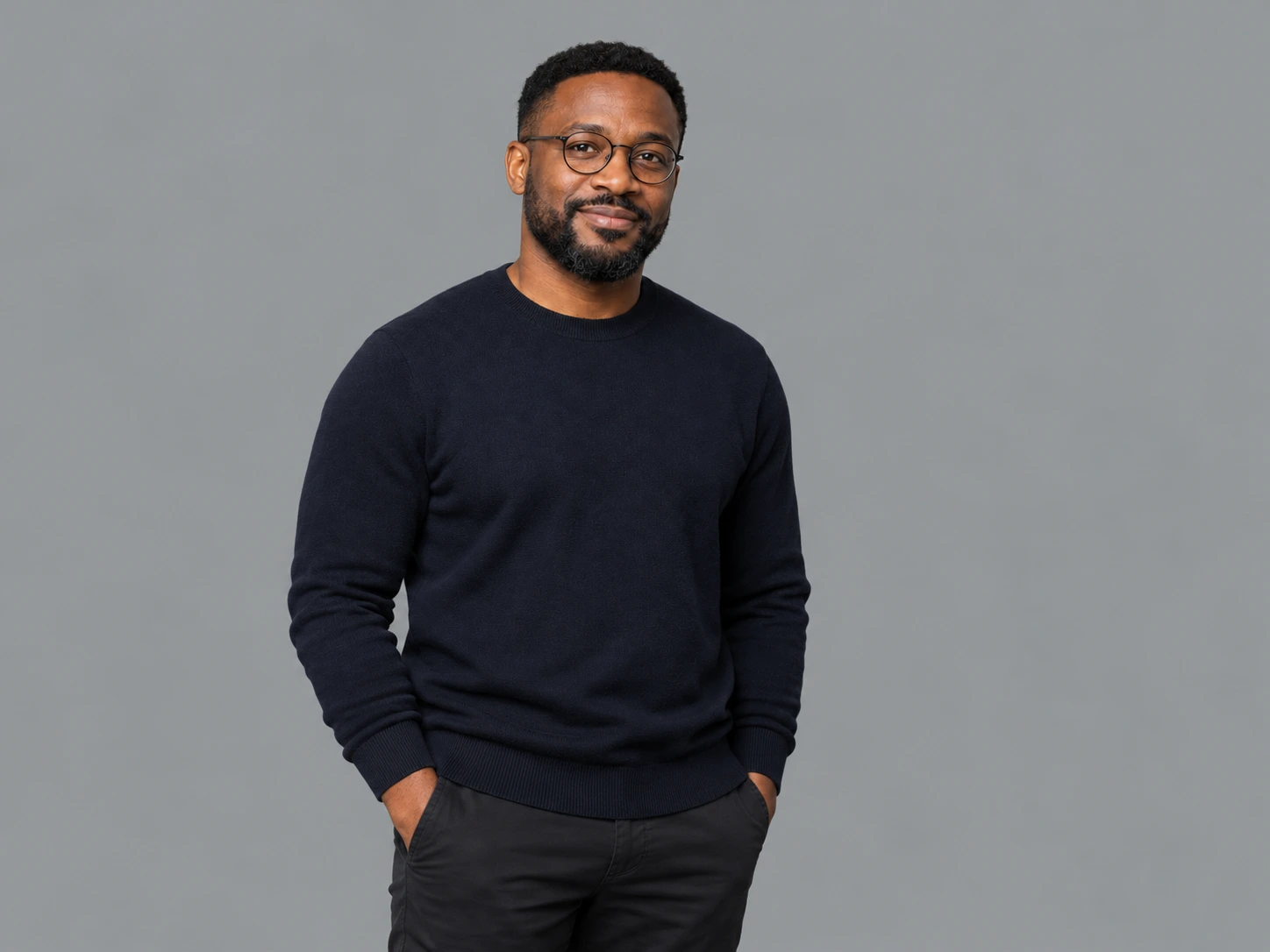 AI-generated temporary portrait of a fictional growth consultant, to be replaced with Emmanuel’s real photo